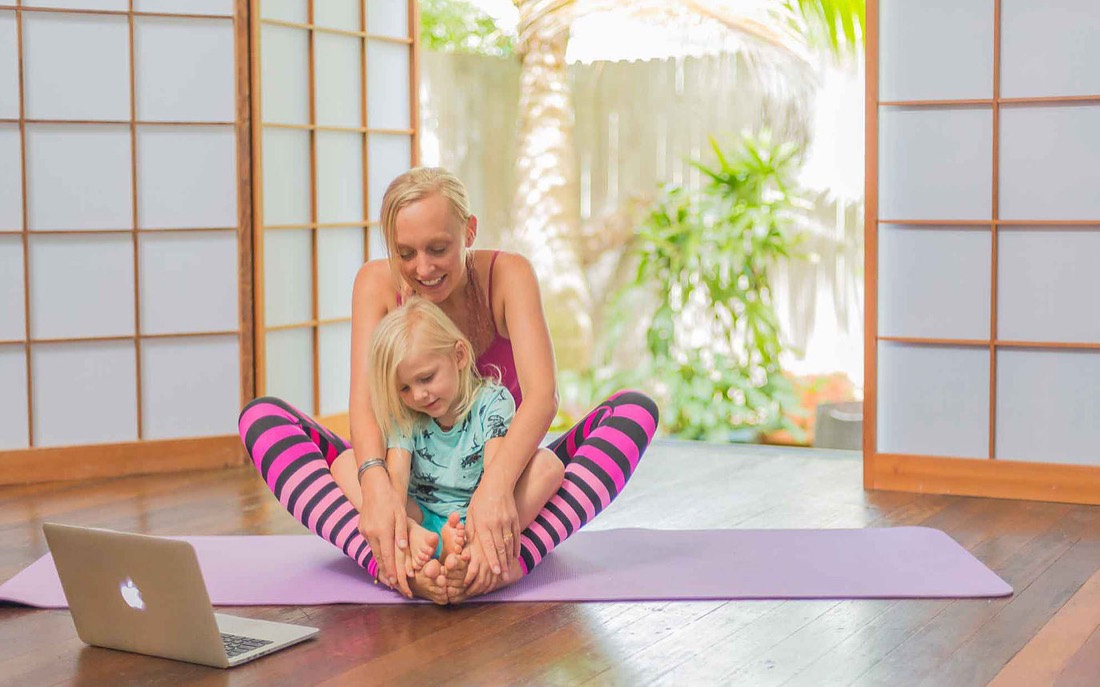 Rainbow Yoga teachers practising together during a live training