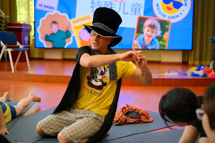 Rainbow Yoga teacher guiding children through an imaginative story activity